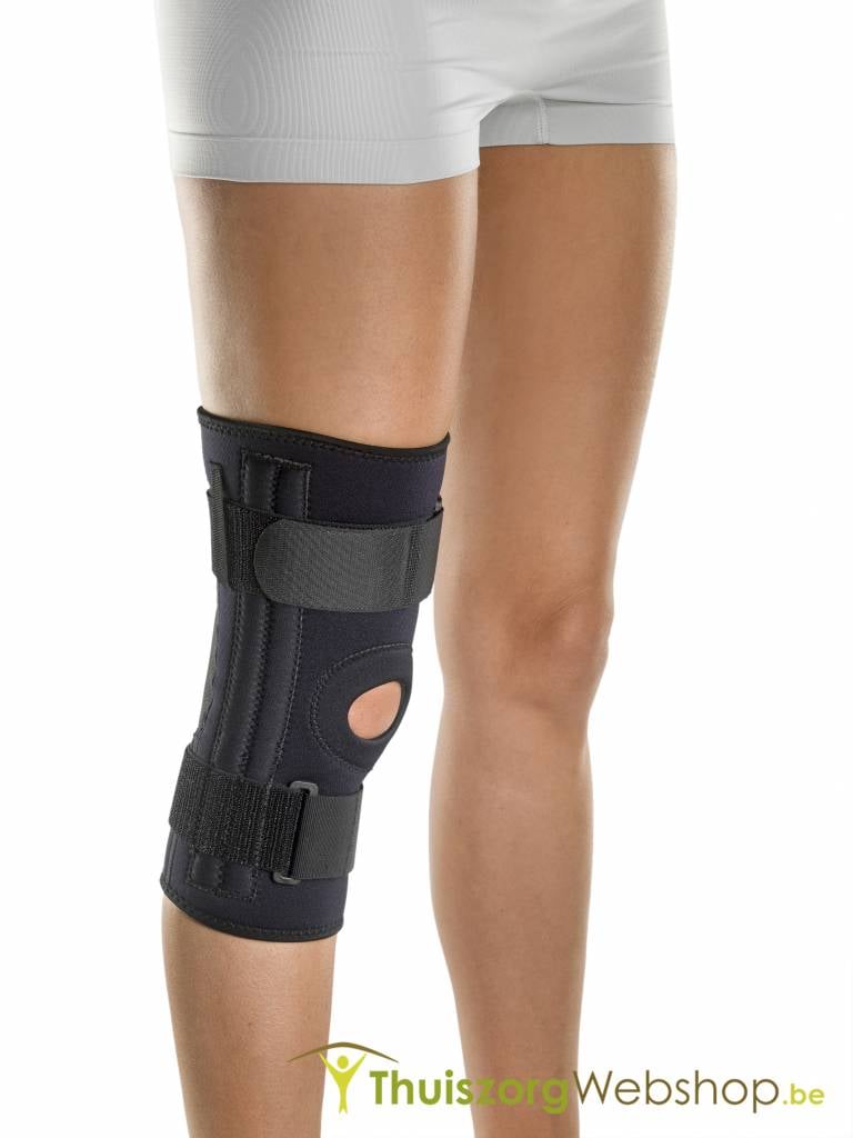 Knee bandage with flexible spring