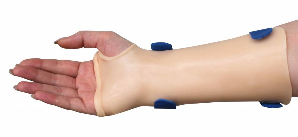 Pre-cut thumb hole wrist splint