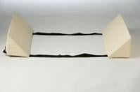 Wedges for lateral support in bed, connected with beige strips