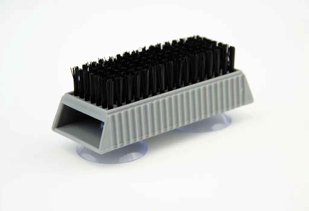 Hand brush with suction cups