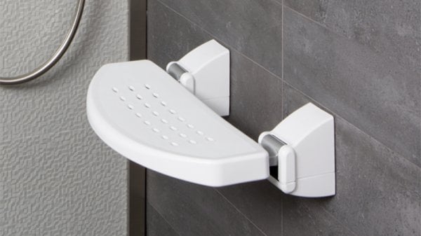 Compact shower seat for wall mounting 