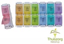 Boîte à médicaments colorée pendant une semaine avec des boutons-poussoirs pratiques