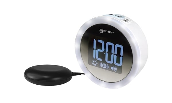 Loud alarm clock with vibrating pillow and light flash