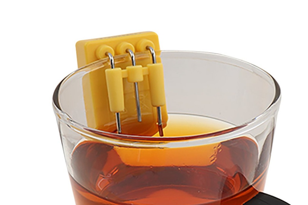 Indicateur de liquide suspendu au bord d'une tasse ou d'un verre