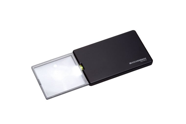 Pocket-sized slide-in magnifier