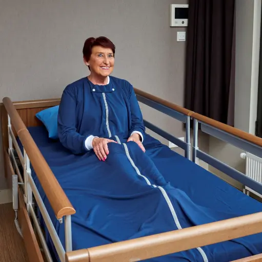 Mattress-encompassing nursing blanket with long sleeves and front zipper